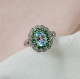 Blue Topaz, Green Garnet & Diamond Double Halo Ring