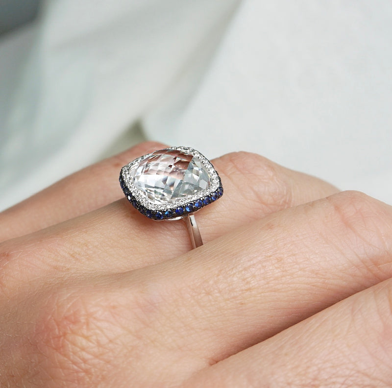 White Topaz, Diamond & Sapphire Halo Dress Ring