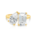 Tahlia pear shape and emerald cut diamond engagement ring in yellow gold Sydney.