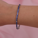 Close-up of 18ct white gold bracelet showcasing blue sapphires and diamonds, available at York Jewellers Penrith.