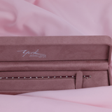 Detail of 18ct white gold ruby and diamond bracelet showing the polished finish and stone setting.