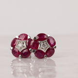 18ct white gold fancy stud earrings featuring natural oval shaped rubies and diamond accents available at York Jewellers Penrith and Warriewood (Sydney). 
