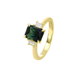 18ct yellow gold Valerie Ring featuring a certified 2.45ct radiant cut natural Australian teal sapphire with trapezoid diamond accents, available at York Jewellers Penrith and Warriewood (Sydney).