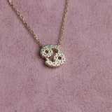 Close up of 9ct yellow gold Cancer pendant attached to a matching 40cm plus 5cm chain, available at York Jewellers Penrith and Warriewood (Sydney).