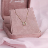 9ct yellow gold Libra pendant attached to a matching 40cm plus 5cm chain, available at York Jewellers Penrith and Warriewood (Sydney).