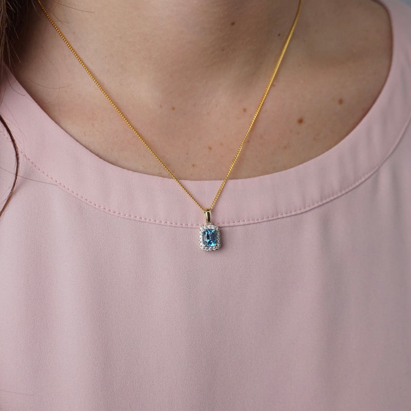 Blue Topaz & Diamond Halo Pendant