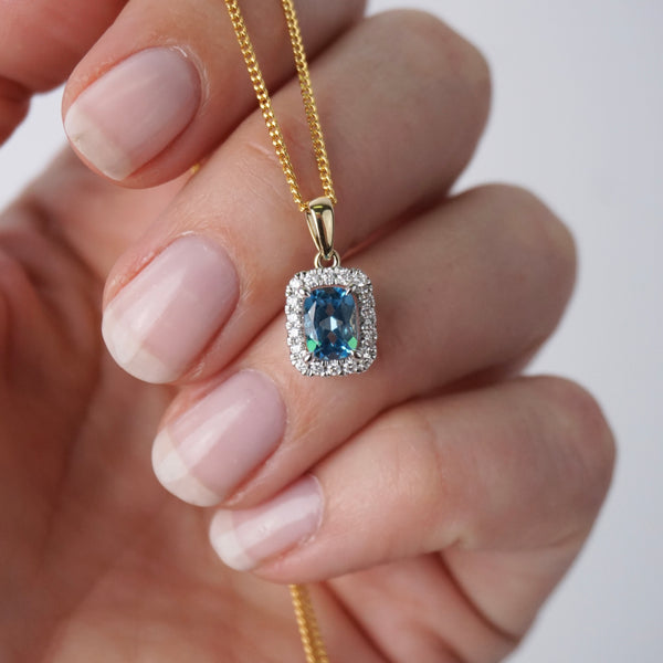 Blue Topaz & Diamond Halo Pendant