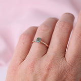 Elegant rose gold engagement ring with solitaire sapphire displayed on hand available at York Jewellers Penrith and Warriewood (Sydney).