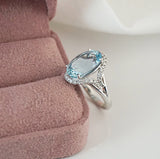 Oval Aquamarine and Diamond Ring
