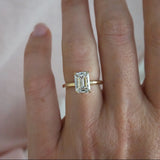 Emily-Emerald Cut Solitaire Diamond Engagement Ring Set in Yellow Gold Band