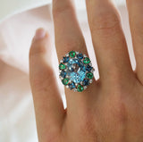 Sky Blue Topaz, Emerald & London Blue Topaz Fancy Halo Ring