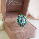 Sky Blue Topaz, Emerald & London Blue Topaz Fancy Halo Ring