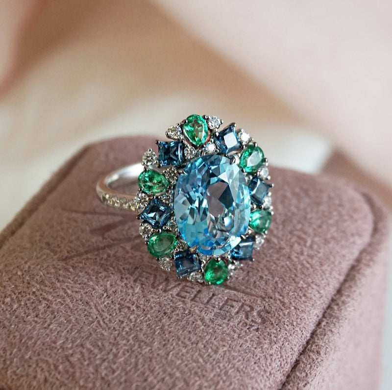 Sky Blue Topaz, Emerald & London Blue Topaz Fancy Halo Ring