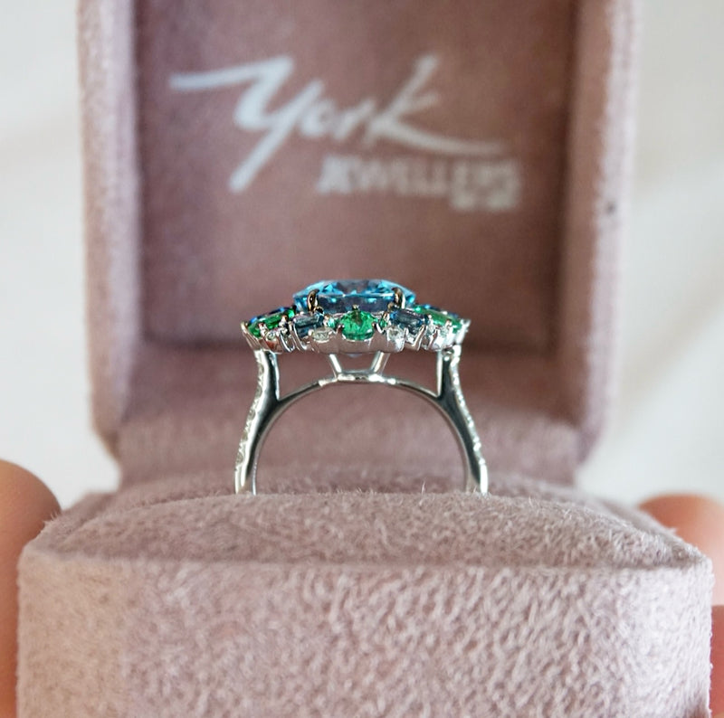 Sky Blue Topaz, Emerald & London Blue Topaz Fancy Halo Ring