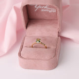 Elegant solitaire ring with colour-shifting Madagascar sapphire set in 18ct yellow gold band.