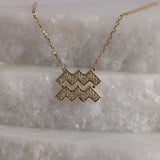 Personalised 9ct yellow gold Aquarius diamond pendant available from Sydney fine jeweller York Jewellers.