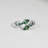 Close-up of 9ct white gold ring showcasing bezel set pear cut natural Australian teal sapphires, available at York Jewellers Penrith.
