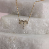 Personalised 9ct yellow gold Aries diamond pendant available from Sydney fine jeweller York Jewellers.
