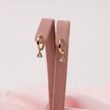 Elegant 9ct yellow gold bezel set trilliant cut diamond drop earrings with contemporary design available at York Jewellers Penrith and Warriewood (Sydney).