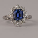 Elegant 18ct white gold sapphire halo dress ring available from Sydney fine jeweller York Jewellers featuring natural blue sapphire and diamonds.