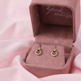 Elegant 9ct yellow gold diamond stud earrings with carcelated setting and delicate natural diamond sparkle in pink York Jewellers box.