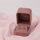 Elegant 9ct yellow gold diamond stud earrings with fine carcelated setting and delicate sparkle in pink York Jewellers Sydney (Penrith and Warriewood) box.