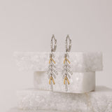 Distinctive 18ct yellow and white gold diamond hoop drop earrings available from Sydney fine jeweller York Jewellers.