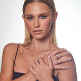 9ct white gold diamond huggie drop earrings paired with matching white gold jewellery, available at York Jewellers Penrith and Warriewood (Sydney).