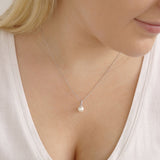 9ct white gold diamond and pearl necklace worn at the collarbone, ideal for layering or wearing alone, available at York Jewellers Penrith.