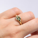 Close-up of 9ct yellow gold ring showcasing a round brilliant cut yellow sapphire, available at York Jewellers Penrith.