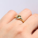 9ct yellow gold Ingrid Ring worn on hand showing a substantial, sunlit yellow sapphire.