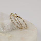 Close-up of 76 lab grown round brilliant cut diamonds in 9ct yellow gold inside outside hoop earrings, available at York Jewellers Penrith and Warriewood (Sydney).