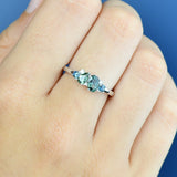 Close-up of 18ct white gold ring showcasing an arrangement of natural Australian sapphires in varied cuts and colours, available at York Jewellers Penrith.