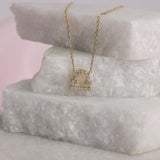 Personalised 9ct yellow gold Libra diamond pendant available from Sydney fine jeweller York Jewellers.