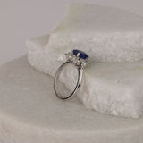 Underside of luxury 18ct white gold sapphire and diamond halo statement ring, available at York Jewellers Penrith.