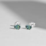 Close-up of 9ct white gold stud earrings showcasing oval cut natural Australian parti sapphires, available at York Jewellers Penrith.