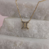 Personalised 9ct yellow gold Pisces diamond pendant available from Sydney fine jeweller York Jewellers.