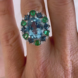 Sky Blue Topaz, Emerald & London Blue Topaz Fancy Halo Ring