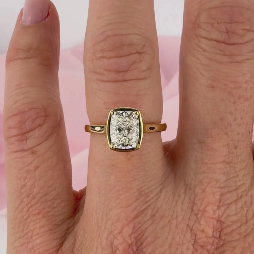 Cushion cut diamond engagement ring on hand yellow gold Sydney Australia Callie ring.
