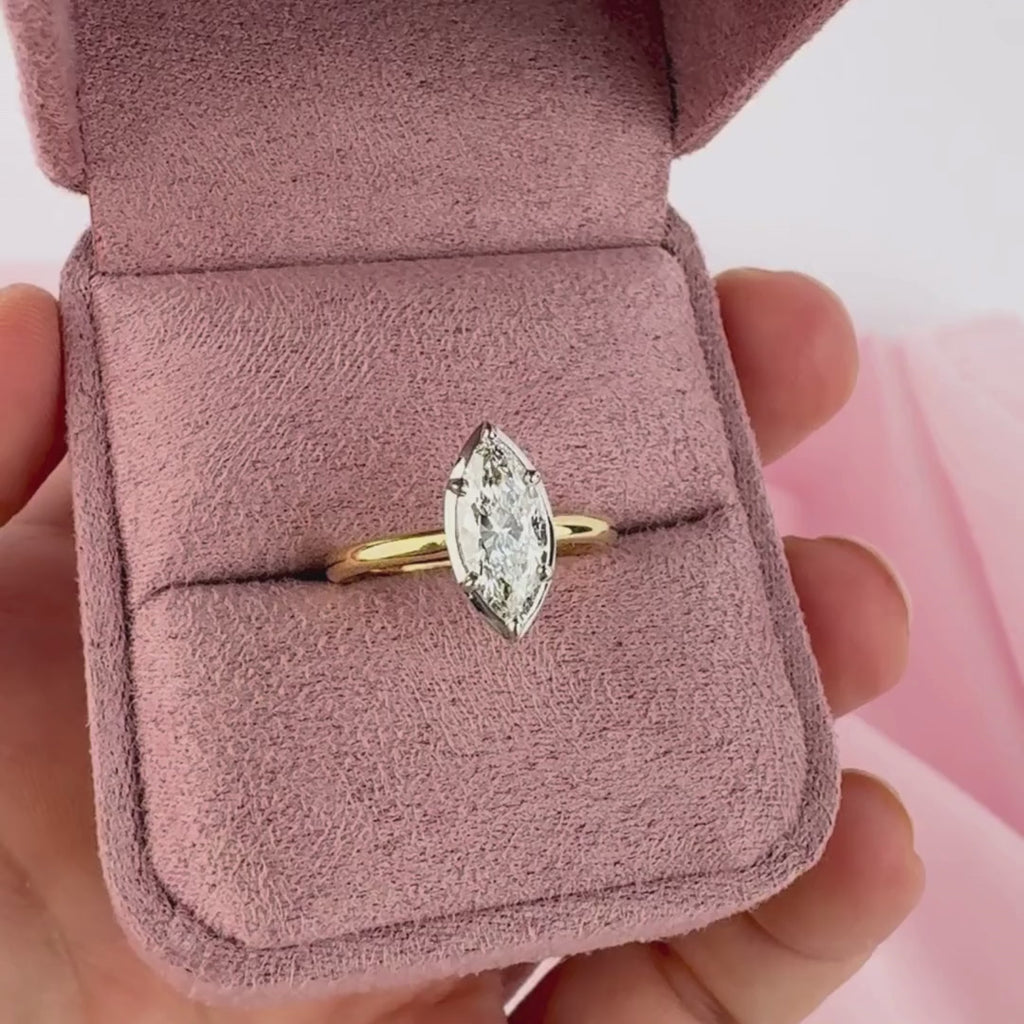 Elegant Mariah marquise diamond engagement ring two tone gold on hand York Jewellers Sydney.