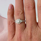 Halo Trilogy Ring with Baguette and Round Brilliant Cut Diamonds