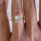 Emily-Emerald Cut Solitaire Diamond Engagement Ring Set in Yellow Gold Band