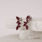 Statement 18ct white gold ruby leaf style drop earrings available from Sydney fine jeweller York Jewellers.