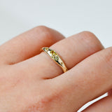 9ct yellow gold Saffron Ring worn on hand showing warm, sunlit yellow sapphire colour.