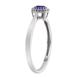 Close-up of 9ct white gold ring showcasing a natural sapphire centre stone framed by 19 diamonds available at York Jewellers Penrith.