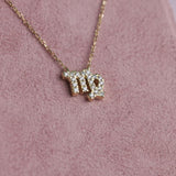 Close-up of 9ct yellow gold Virgo pendant showcasing 21 carcelated round brilliant cut diamonds (0.13ct total) available at York Jewellers Penrith.