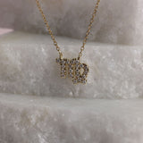 Personalised 9ct yellow gold Virgo diamond pendant available from Sydney fine jeweller York Jewellers.