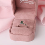 Close-up of emerald cut sapphire set in four-claw 18ct white gold solitaire ring, in-store at York Jewellers Penrith and Warriewood (Sydney).
