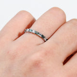 18ct white gold Whitney Ring worn on hand showing the alternating rhythm of colour and diamond sparkle.