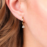 9ct yellow gold lab grown diamond drop huggie earrings worn on ear showing modern movement and sparkle available at York Jewellers Penrith.